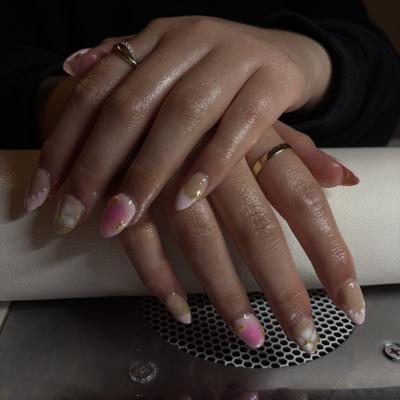 Pink and mauve marble ombre nails flecked with gold